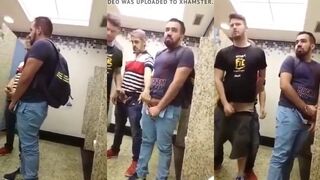 Watch this hot dude give a sloppy BJ & handjob in a public restroom