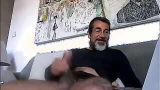 Watch this hot daddy give a hot and steamy solo handjob to his lucky amateur boy