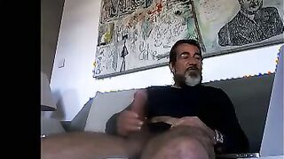 Watch this hot daddy give a hot and steamy solo handjob to his lucky amateur boy