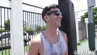 Tattooed dude gives a sloppy caboose handjob with a lollipop