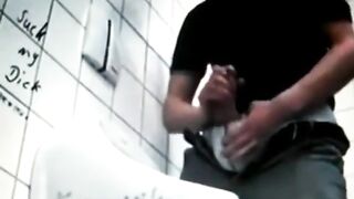 Zeri Milking XXL goes wild in a public restroom, giving a sloppy handjob to a chubby guy