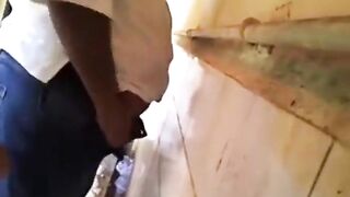 Watch this guy stroke his meat in public rest room and get a hot cumshot
