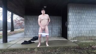 Watch this dude stroke his huge cock in public, then take a cumshot on his big dick