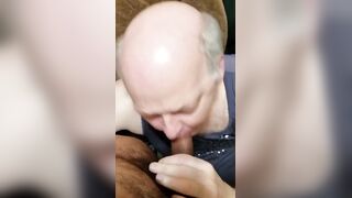 Hairy old guy gives a sloppy BJ and strokes a big black rod
