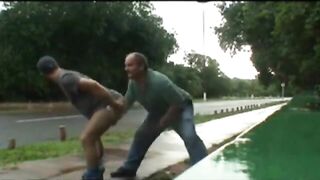 Hot guys take turns banging each other in public near a road