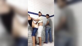 Watch this dude bareback and give a public handjob in the restroom