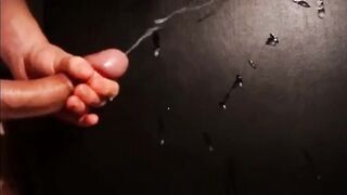 Watch this hairy dude stroke his big dick and take two thick loads in his mouth