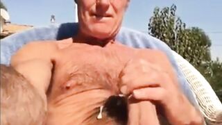 Watch this amateur daddy give a hot handjob to his hung hunk and get a massive cumshot
