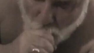 Big-dicked bear jerks off his horny son's mouthful of cum
