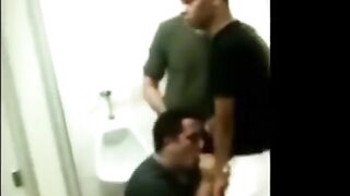 Kinky dude enjoys sucking in public locker room with cumshot on his hand