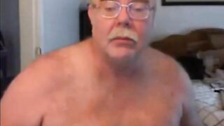 Amateur guy with a huge hairy body gives a hot handjob to his horny son