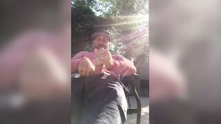 Hairy guy strokes his big dick in the garden & cums hard
