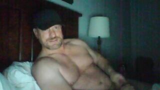 Muscular daddy gives hot jerk off and cumshot to his petite hunk