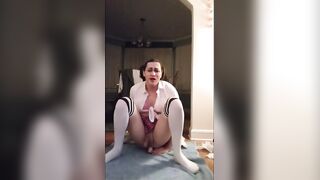 Watch this crossdresser jerk off to a cumshot while masturbating in the 1970s