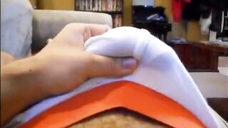 Hairy guy creampies himself while playing with himself through his tight shorts
