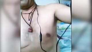 Watch this Chinese stud tease and jerk off with his massive toy - no cum included!