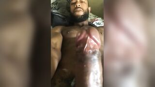 Amateur bear guy gives a hot handjob and jerks off to his massive black dick