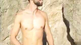 Amateur hairy guy gives public beach handjob and gets a cumshot