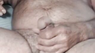 Watch as naughty grandpa gives a wild handjob and masturbates on cam