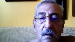 Watch this horny grandpa stroke his big dick live on webcam for a cumshot frenzy