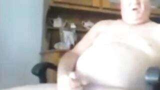 Watch this chubby bear stroke his big dick and jerk off to cumshot while pleasing himself solo