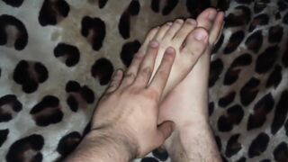Watch as the studly gingerdemonstrates his favorite soles and gives a hairy, hairy, handjob to his friend