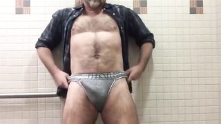 Watch this hung dude strip down & stroke his big hard cock until he explodes in a cumshot!