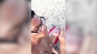 Watch this hairy amateur give a public beach head and get a messy facial