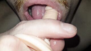 Watch Joy's wet mouth take on a thick dildo in a solo job as he gives a deep-throat blowjob in ASMR style