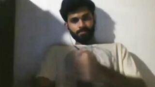 Watch this Indian guy jerk off to HD porn on webcam with a big dick