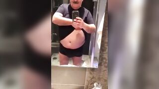 Watch this chubby guy show off his goods while teasing his partner