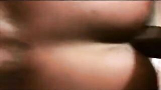 Amateur babe takes on a massive black rod in raw bareback action
